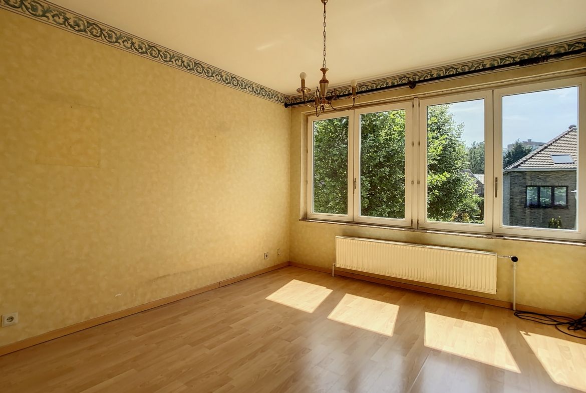 Woonkamer - Prachtig 3-fronig huis met tuin & garage - Ukkel