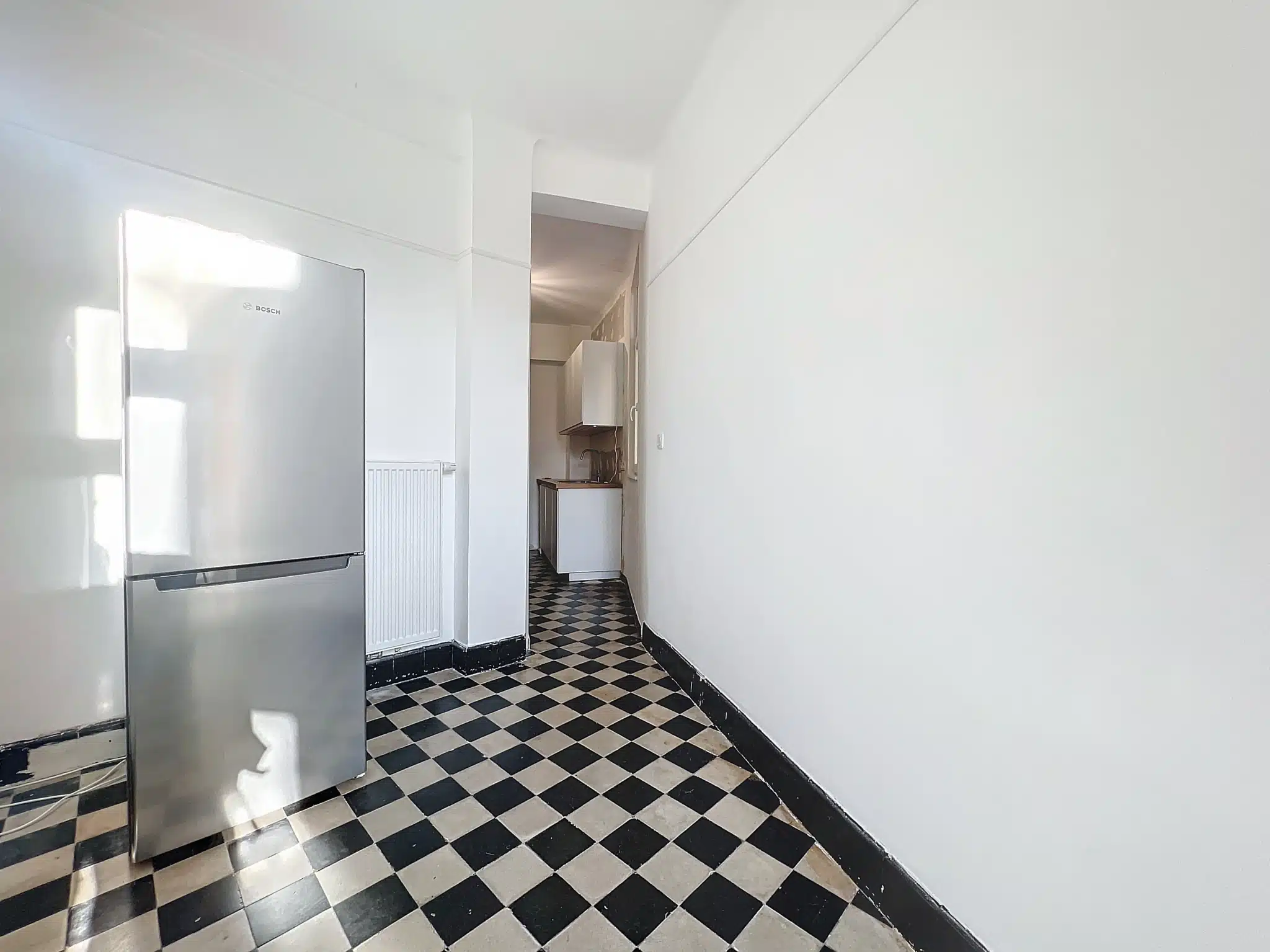 Modern Kitchen with Tiled Floor in Black and White Kitchen - Molière/Vanderkindere - 2 bedroom apartment - Balcony - Forest