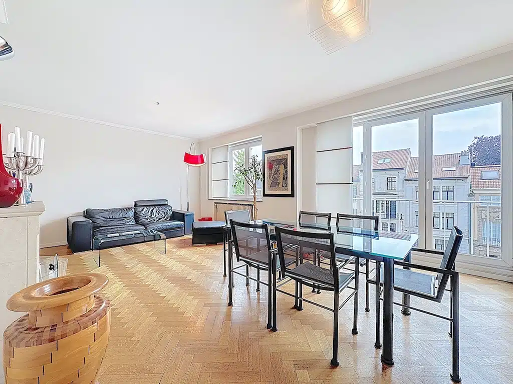 Modern living room with leather sofa and elegant dining area Living room - 2bed apartment with outdoor space - Uccle