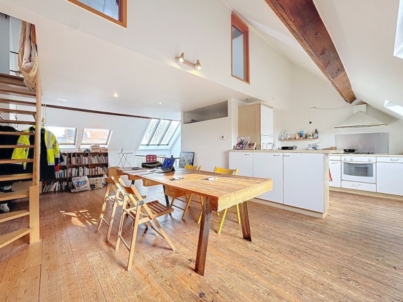 Bright kitchen with dining area, modern design and warm ambience in [Locality].