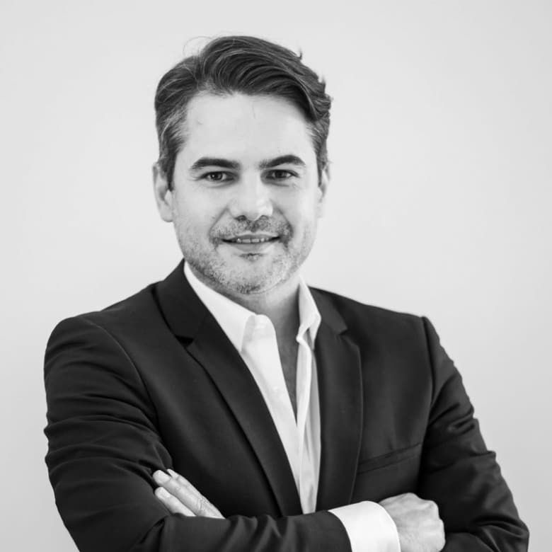 Professional man in black and white portrait confidence elegance parisian atmosphere romain bourja