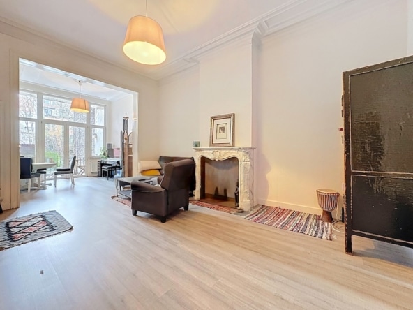 Salon ouverte avec cheminee et vue verte you real estatejpg    place brugmann 2 ch  terrasse  ixelles