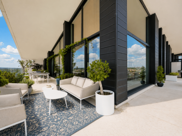 Penthouse terrace with outdoor living and dining area and urban view 3-bedroom apartment anderlecht